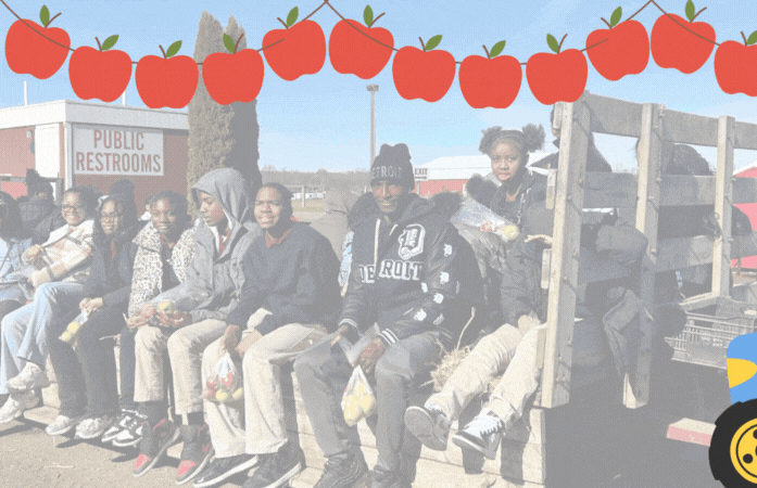  tractor going a across an apple border